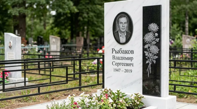 Памятник с гравировкой хризантем — выполненная работа «Рыбаков» в Уфе