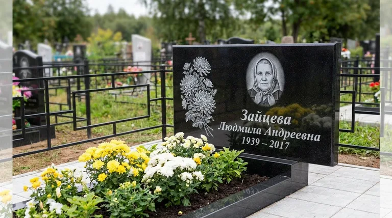 Памятник с гравировкой хризантем — выполненная работа «Зайцева» в Уфе