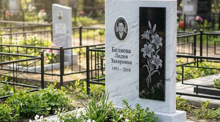 Памятник с гравировкой лилий — выполненная работа «Беляева» в Уфе