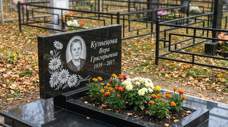 Памятник с гравировкой ромашек — выполненная работа «Кузнецова» в Уфе