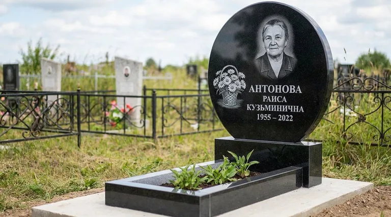 Памятник с гравировкой ромашек — выполненная работа «Антонова» в Уфе