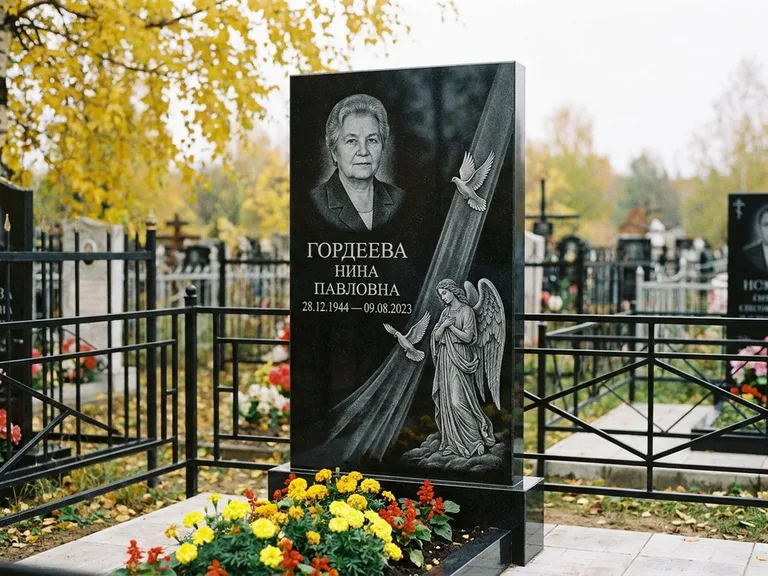 Памятник с гравировкой ангела — гравировка ангела с голубем по диагонали стелы, работа «Гордеева» в Уфе