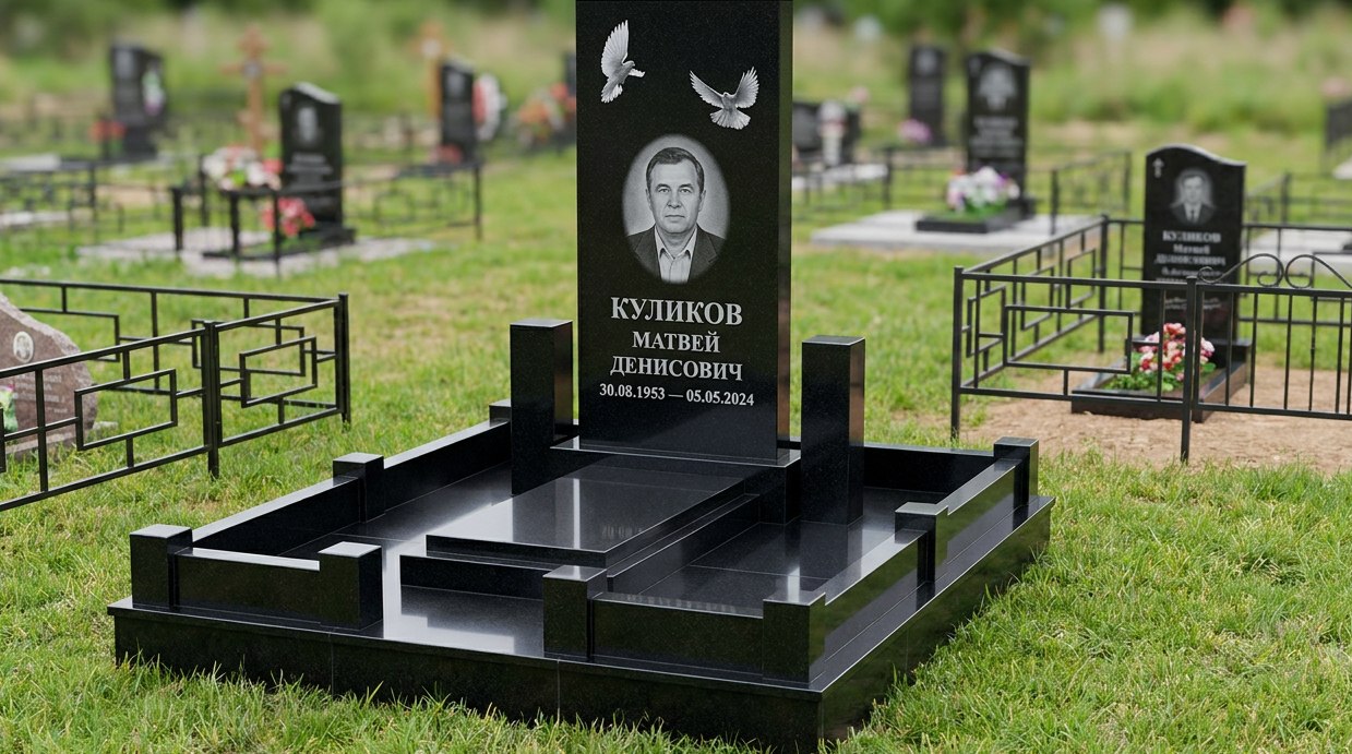 Пример дизайна: Гранитный памятник вертикальный с гравировкой голубей — фото и цена